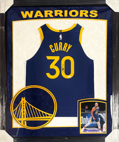 Golden State Warriors Stephen Curry Hand Signed Autographed Authentic Blue Jersey Framed with Suede Matting, XL 3D Logo, & Cutout Lettering Includes JSA COA