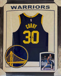 Golden State Warriors Stephen Curry Hand Signed Autographed Authentic Blue Jersey Framed with Suede Matting, XL 3D Logo, & Cutout Lettering Includes JSA COA